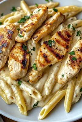 Creamy Chicken Alfredo Pasta with Grilled Chicken Strips