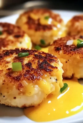 Golden Cheddar Crab Cakes with Zesty Lemon Butter Drizzle